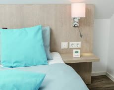 Das Homematic IP Thermostat kann frei stehend positioniert oder an einer Wand befestigt werden